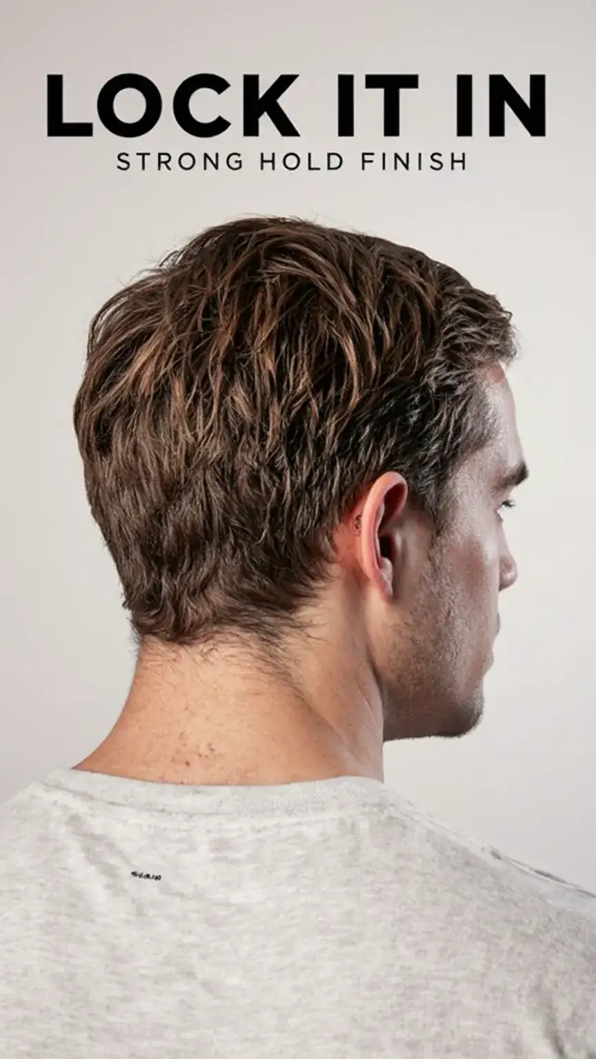 Finished short men's hairstyle with strong hold hairspray, demonstrating long-lasting styles. Keywords: hairspray for men, strong hold hair products, men's hair styling.
