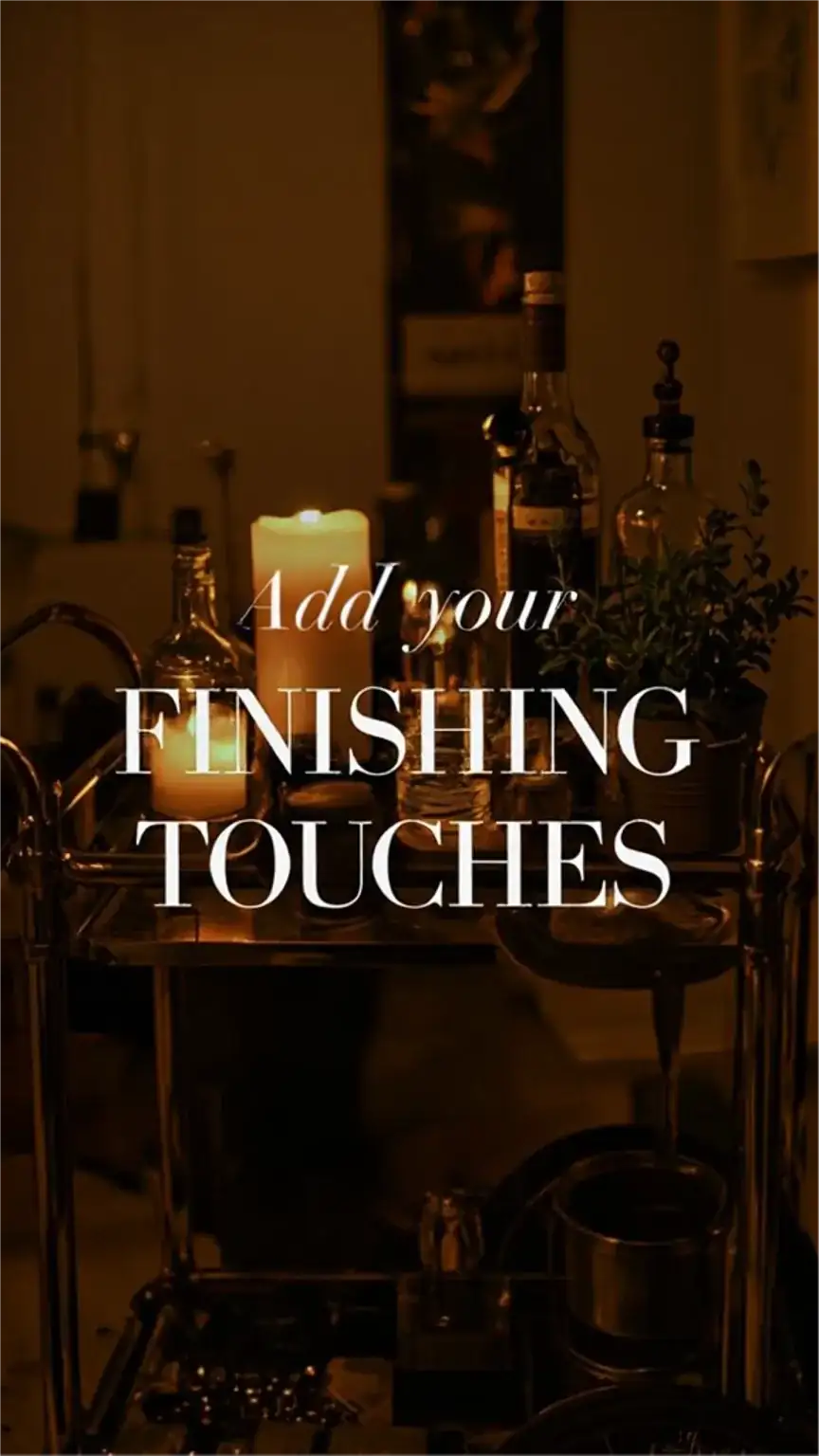 Finishing touches for a DIY home bar, creating an inviting atmosphere with candles and herbs, masculine home bar decor for entertaining.