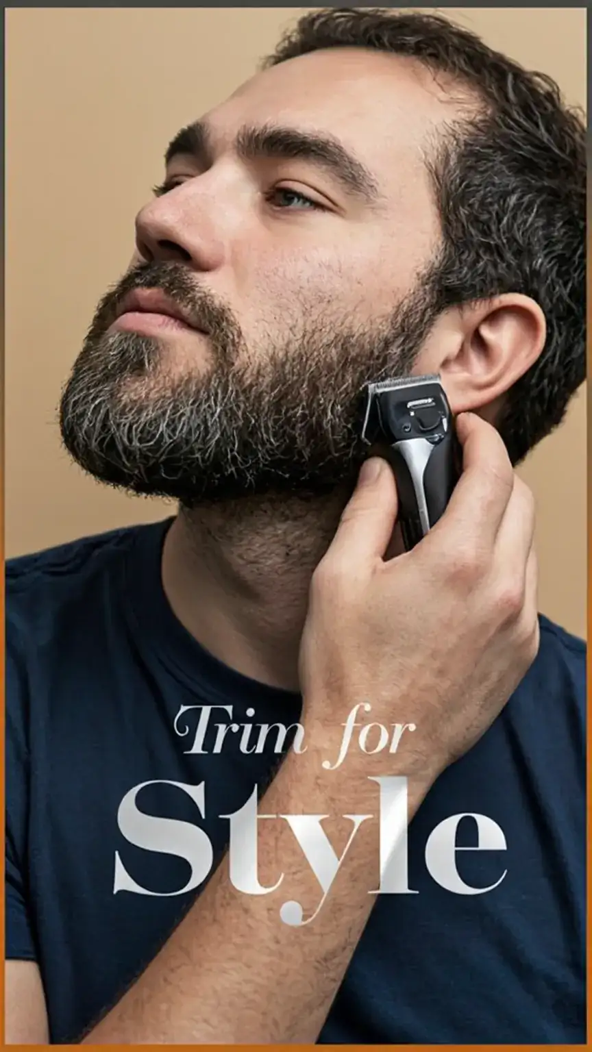 Man using a beard trimmer to groom his facial hair, showcasing beard trimming techniques. Beard grooming, beard maintenance, stylish beard shaping.